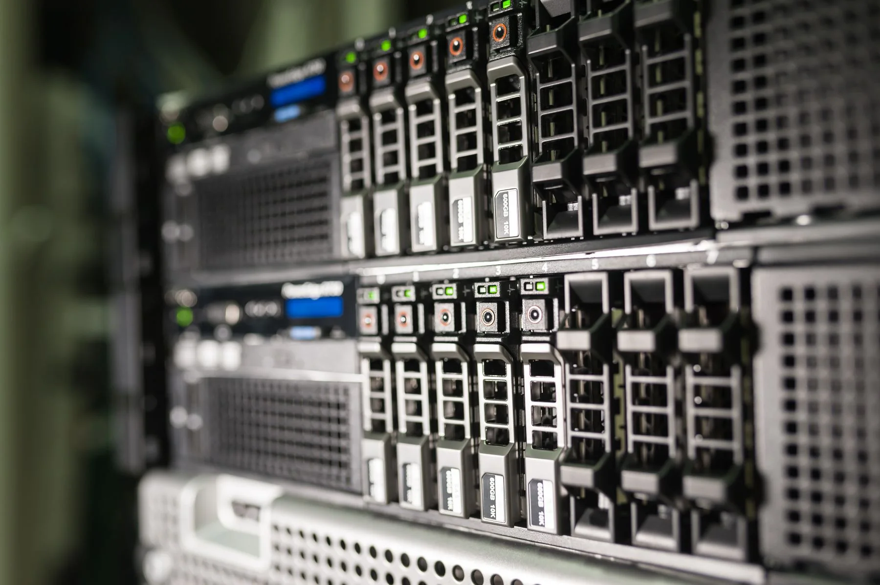 Close-up of network and compute hardware in a server rack.